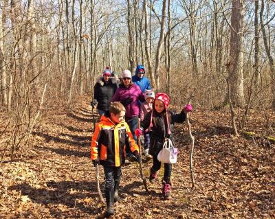Dartmouth, MA news - The trackers set off through the woods, looking for game trails, dens, and prints in the mud