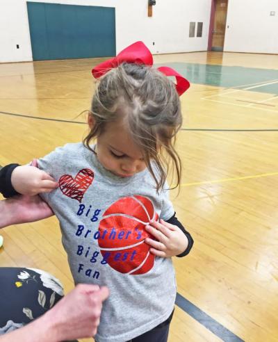 Dartmouth, MA news - sports - Julia Afonso, 3, shows off the shirt her mother Ana made