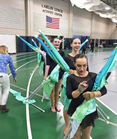 Millbury High School Winter Guard waiting on the sidelines before their performance, for which they won first place in their class