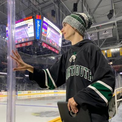 Dartmouth High hockey superfan Liam Amaral watches at the Dunkin’ Donuts Center in Providence. Photo by: Kathleen Amaral