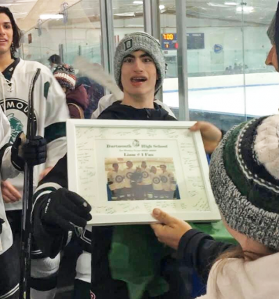 The team presented Liam with a signed certificate in late January as proof that he’s their number one fan. Photo courtesy: Kathleen Amaral