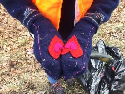 Dartmouth, MA news - Ouellette shows off her mittens, which were made for her by a friend