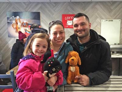 Lilith Souza, 4, with mom Jessica and dad Jay came out for breakfast and support. Photo by: Kate Robinson