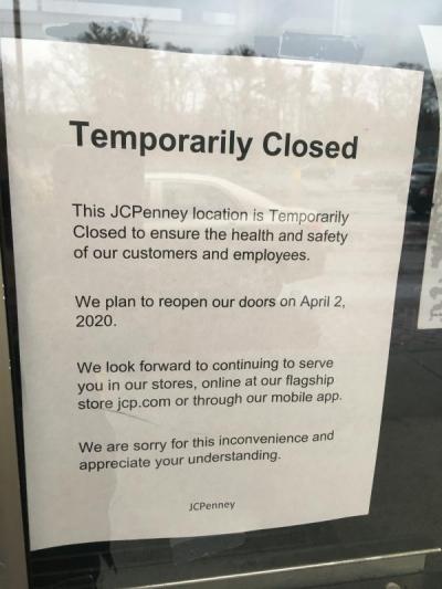 Signs up in many store and restaurant windows announced the temporary closures. Photo by: Sandy Quadros Bowles