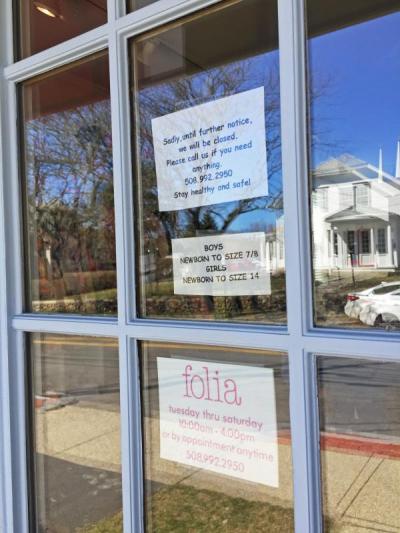Dartmouth Week - Dartmouth, MA news - coronavirus - A sign in the door at Folia stated the shop would be closed until further notice