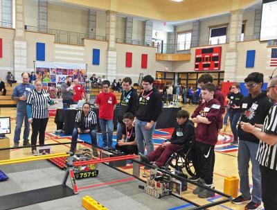 Dartmouth Week - Dartmouth, MA news - The Alumineers watch their robot (7571) during the autonomous round, where for 30 seconds it acts on its own