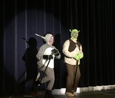 James Dorsey as Donkey and Landon Rodrigues as Shrek do a musical number during the performance