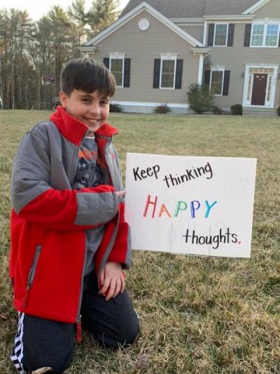 Dartmouth Week - Dartmouth, MA news - Third grader Collin Dacosta in front of the sign made for him by Murphy. Photo courtesy: Lorrie Murphy