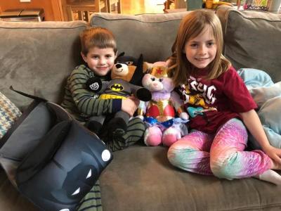 Grady LaBelle, 5, with big sister Addison, a second grader at DeMello, show off their super hero animals Wonder Kitty and Bat Bear. Photo courtesy: Jennifer Benevides Grady LaBelle, 5, with big sister Addison, a second grader at DeMello, show off their super hero animals Wonder Kitty and Bat Bear. Photo courtesy: Jennifer Benevides