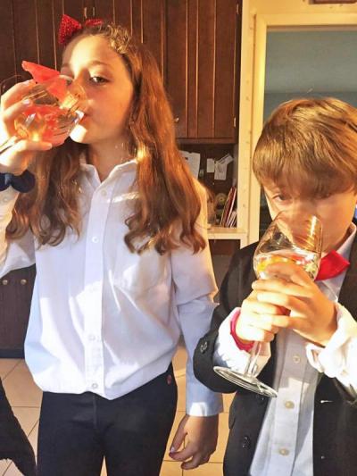 Third grader Charlee and first grader Pierce Norton of Quinn School sampled fruit-infused sparkling water. The pair won "Cutest dinner duo.” Photo courtesy: Karee Norton Third grader Charlee and first grader Pierce Norton of Quinn School sampled fruit-infused sparkling water. The pair won "cutest dinner duo”. Photo courtesy: Karee Norton