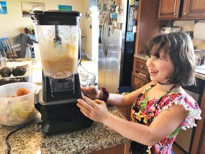 Ariane Santos, 7, made a fruit smoothie that won her the "healthiest snack" category. Photo courtesy: Annemarie Santos