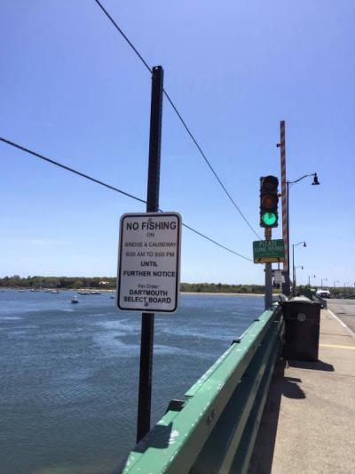 The new signs and cables prohibiting fishing during the day. Photo by: Kate Robinson