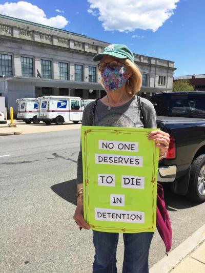 Dartmouth Week - Dartmouth, MA news - Dartmouth resident Ronny K. holds her sign during the protest