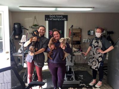 The Pet Tailor staffers show off their pups.