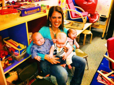 Belanger with infants at her daycare center. Photo courtesy: Sally Belanger/Facebook