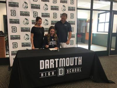 Hannah Bouvier signs her letter of commitment to play girls softball at Gordon College, with her mother Heather Grisso and father Michael Grisso. Dartmouth Week - Dartmouth, MA news