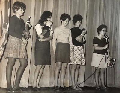 Members of the original Education Committee of Dartmouth Women's Club, circa 1969, perform a puppet show with handmade puppets to celebrate the move from kindergarten to first grade. From left: Diane Whitehead, Theresa Kamm, Janet Sunderland Paiva, Pauline Costa and Chair Enid Silva. Photo courtesy: Enid Silva