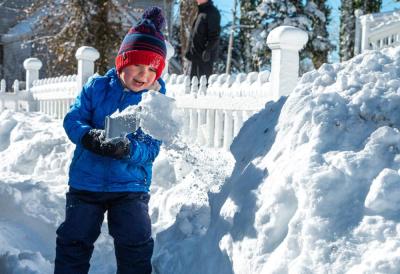 Three-year-old Lincoln Gregory uses his life-sized Lego shovel to help clear his neighbor’s driveway on Jan. 31 after a blizzard dumped over a foot of snow on Dartmouth. Photo by: Morgan Beard