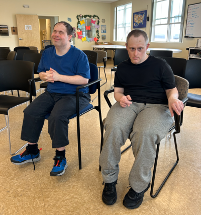 Adam, at right, lives in an apartment in Dartmouth with longtime roommate Michael Wnek, at left. The two, who both have Down syndrome, are cared for all day, every day, by three shifts of residential and community staff provided by the Southeastern Massachusetts Educational Collaborative (SMEC) in Dartmouth.