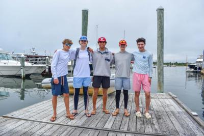 Dartmouth sailors Cooper Lenci,Hoyt Hottel, Ren Hirose and J.D. Lenci with their coach Dom Spinola. Photo by Leighah Beausoleil