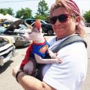 Kate Chellman and her one-year-old Sphinx cat, Cal, enjoy the cars