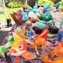 Blown glass figures on display at the festival