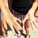 Cousins Sophie Wentworth and Eleni Xifaras show off their henna tattoos