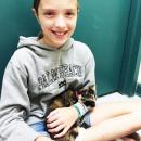 Corinne Hopps, 11, holds kitten Bo Peep