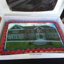 A cake depicting the new building awaits the post-tour celebrations.