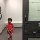 Cell 3 is handicapped-accessible. Weston Raposa, 4, stands nervously inside.