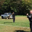 Dartmouth Police K-9 Officer Chris Flechsig rewards German Shepherd Sig for finding an explosive hidden in a truck during a demonstration.