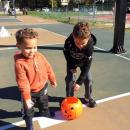 Two-year-old Aiden Spinola tosses eyeballs with big brother Avery, 7.
