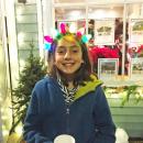 Sophea Souza, 10, shows off her Christmas light headband.