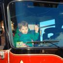 Hunter in the Dartmouth District 1 fire truck en route to Lolly’s Cafe. Photo courtesy: Fire District 1