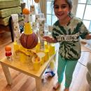 Second grader at Potter School Leah Margarida with her tower, which won her the “Craziest Tower” category. Photo courtesy: Sarah Margarida