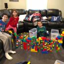 Dartmouth Middle Schooler Mikey Hutson helped his brother Nick, in fifth grade, and sister Danielle, in kindergarten, build their bridge out of Legos. Photo courtesy: Rachel Hutson