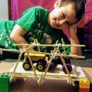 Potter School third grader Cody Flynn used wooden skewers, string, hot glue, cardboard, and Legos to build his bridge. Photo courtesy: Mollie Hamer