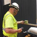 Dartmouth Week - Dartmouth, MA news - Mark Tatlow of Sagamore Plumbing checks on the oxygen lines