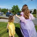 Nora and Kenna McNeil wave to the parade. Photo courtesy: Shannon McNeil