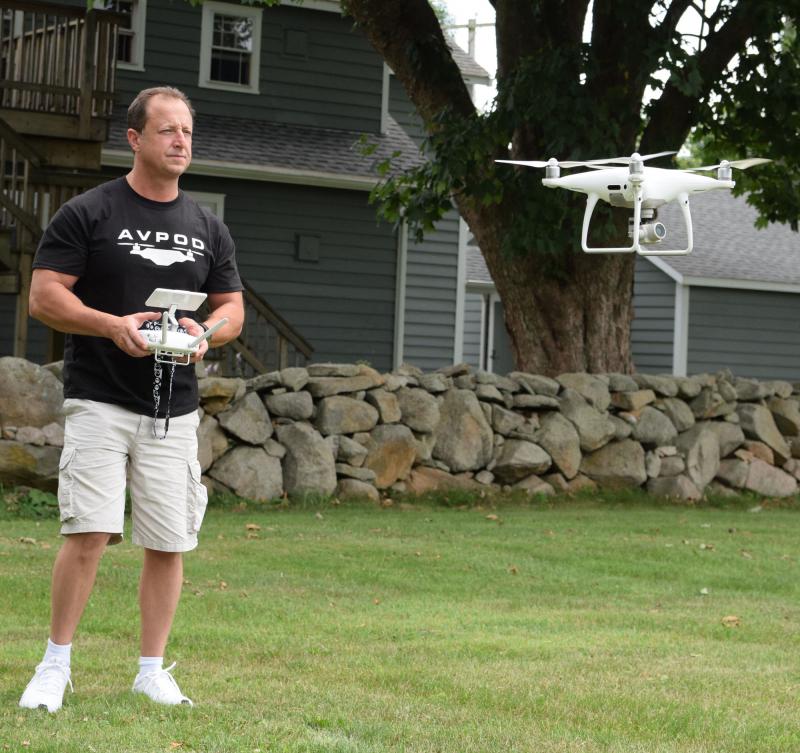 Anthony Franco demonstrates his drone in his backyard. BY DOUGLAS MCCULLOCH