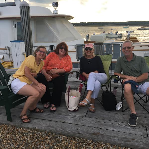 From left, Chris Penry, Roberta Moore, Carol Hudner and Phil Hudner relax together.