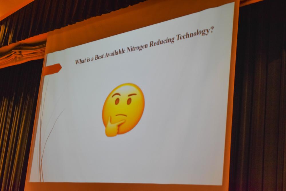 A slide asking what exactly constitutes the technology of the septic tanks residents may have to switch to.