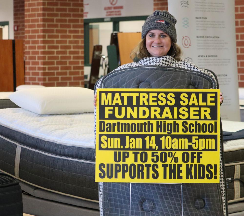 Rachel Hutson, who manages fundraising for the Dartmouth School Music Association, dresses in a mattress costume for the music assocaition’s fifth annual discount mattress fundraiser. Photos by Justice Burnaugh