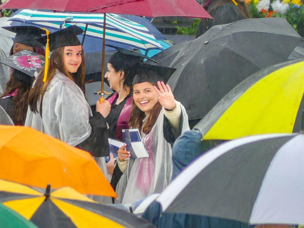 UMass Dartmouth undergraduate students celebrated their commencement in the rain on Thursday, May 16. Photos by Leighah Beausoleil