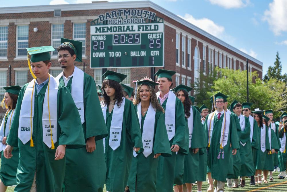 Dartmouth High School graduates make their way onto the field.