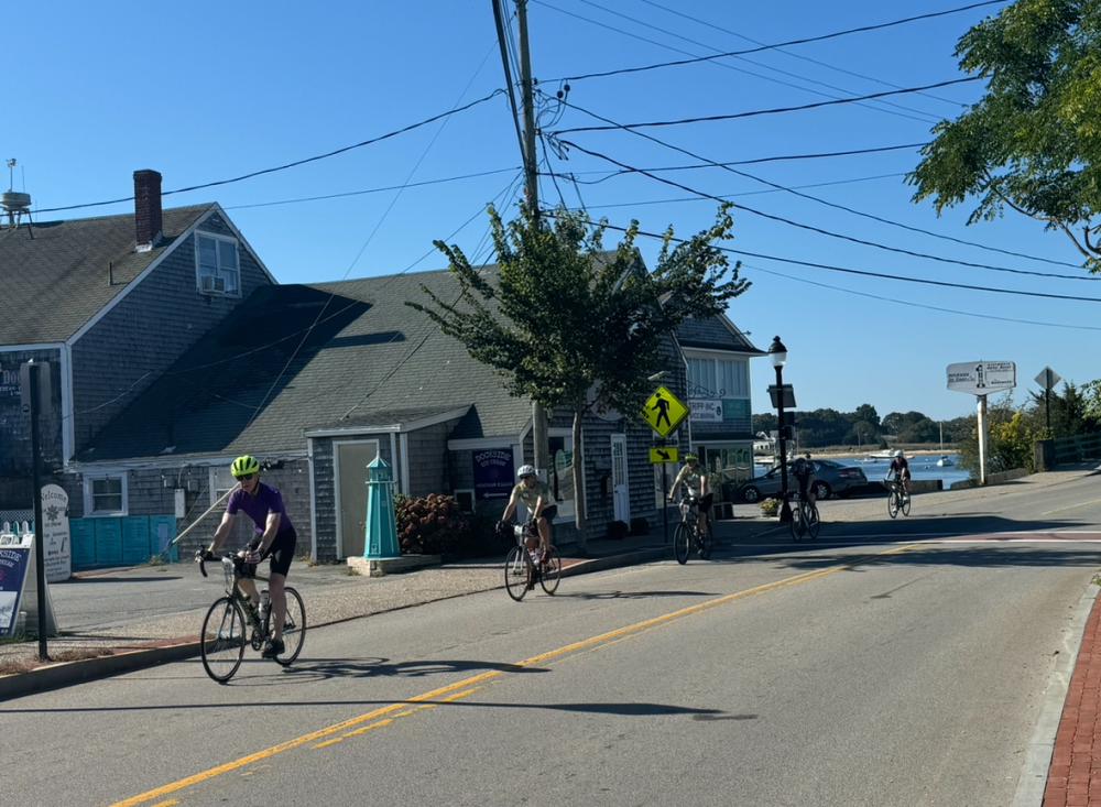 A group of bikers ride into Padanaram Village. A group of bikers ride into Padanaram Village.