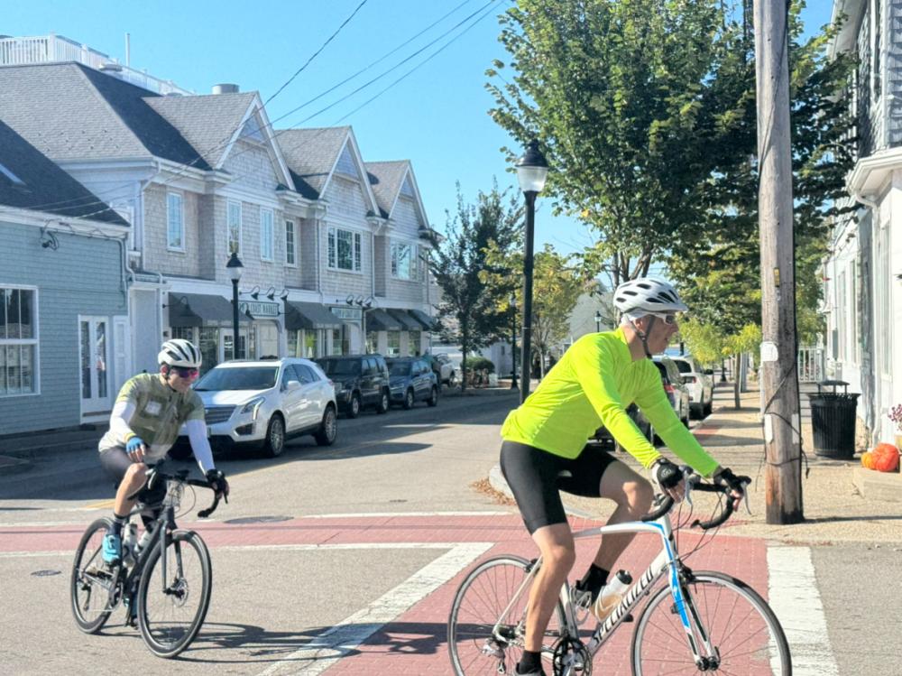 Two riders take a turn. Two riders take a turn.