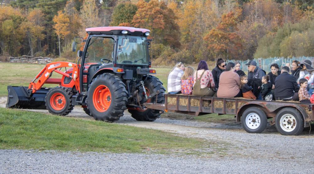 Heading out on a hay ride around the vineyard. o