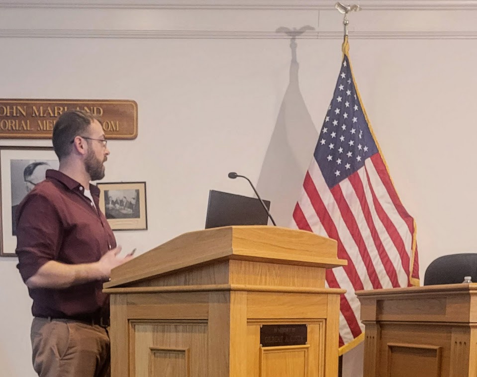 Principal Engineer Damien Dmitruk speaks at a Zoning Board of Appeals meeting on Monday, March 16.