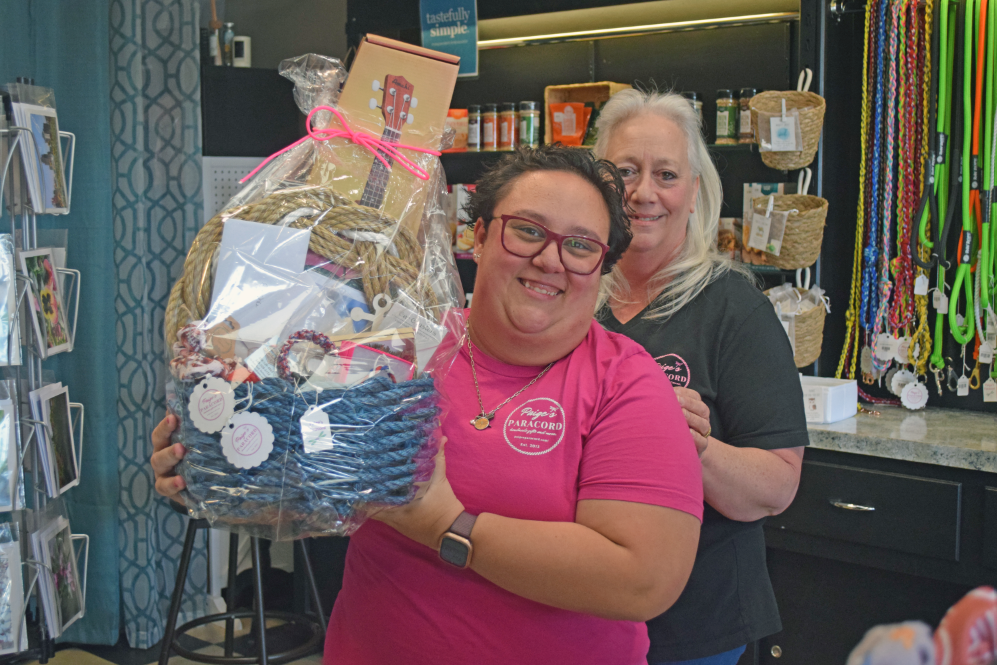 Paige and Marianne Santos with the basket. Photos by Kat Sheridan